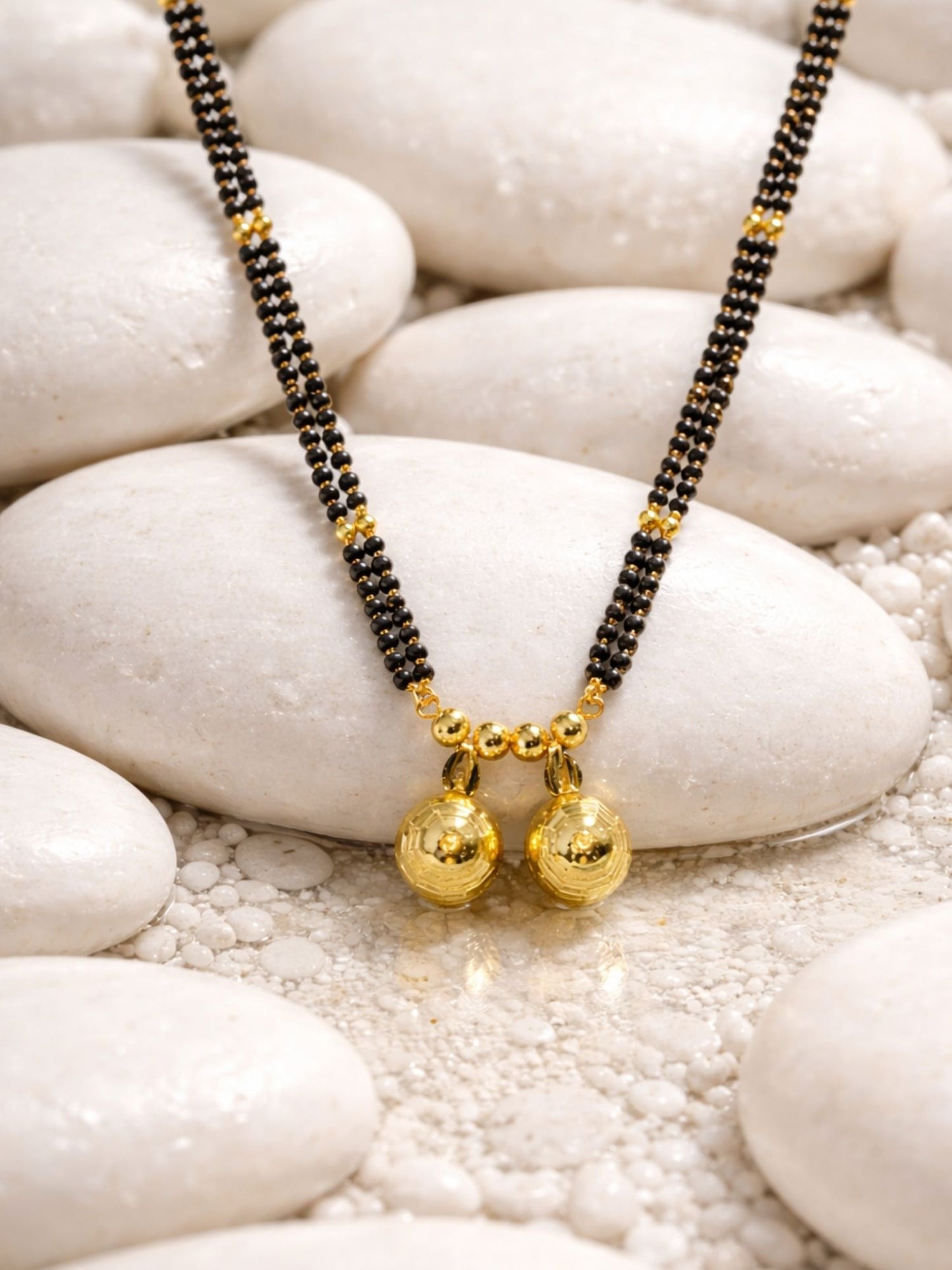 Long Mangalsutra Design with 2 Gold Vati Pendants.