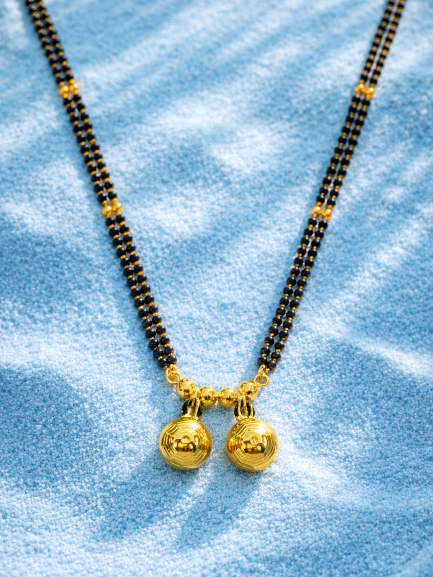 Long Mangalsutra Design with 2 Gold Vati Pendants.