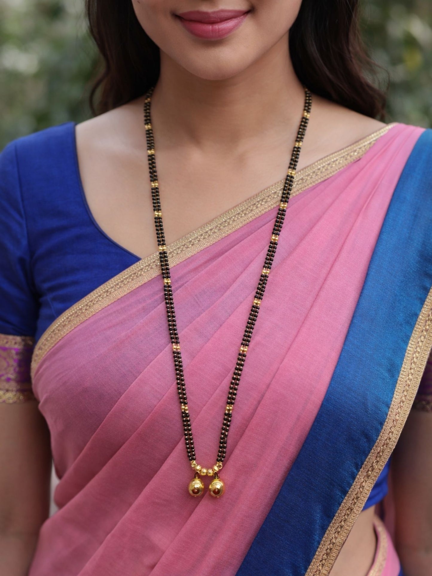 Long Mangalsutra Design with 2 Gold Vati Pendants.