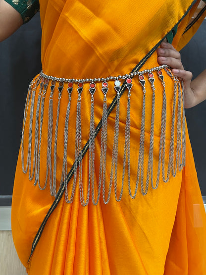 Pearl-studded kamarband on lehenga.