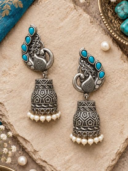 Silver Peacock Jhumka Earrings with Blue Stones