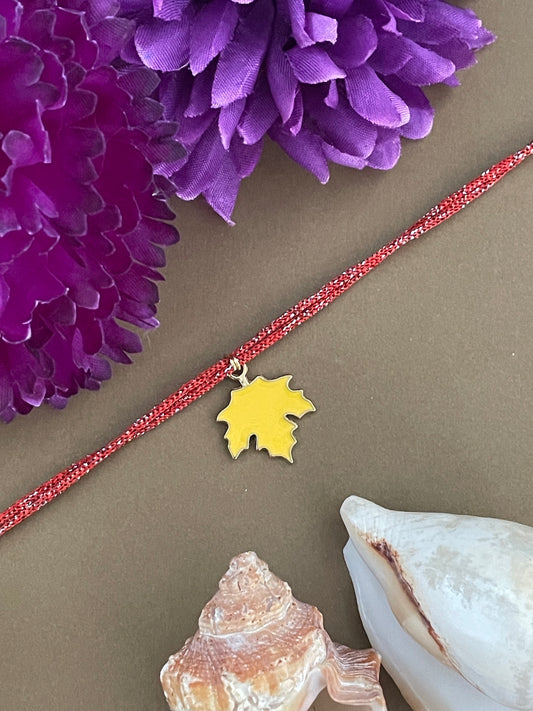 Yellow Maple Leaf Charm Rakhi Lumba
