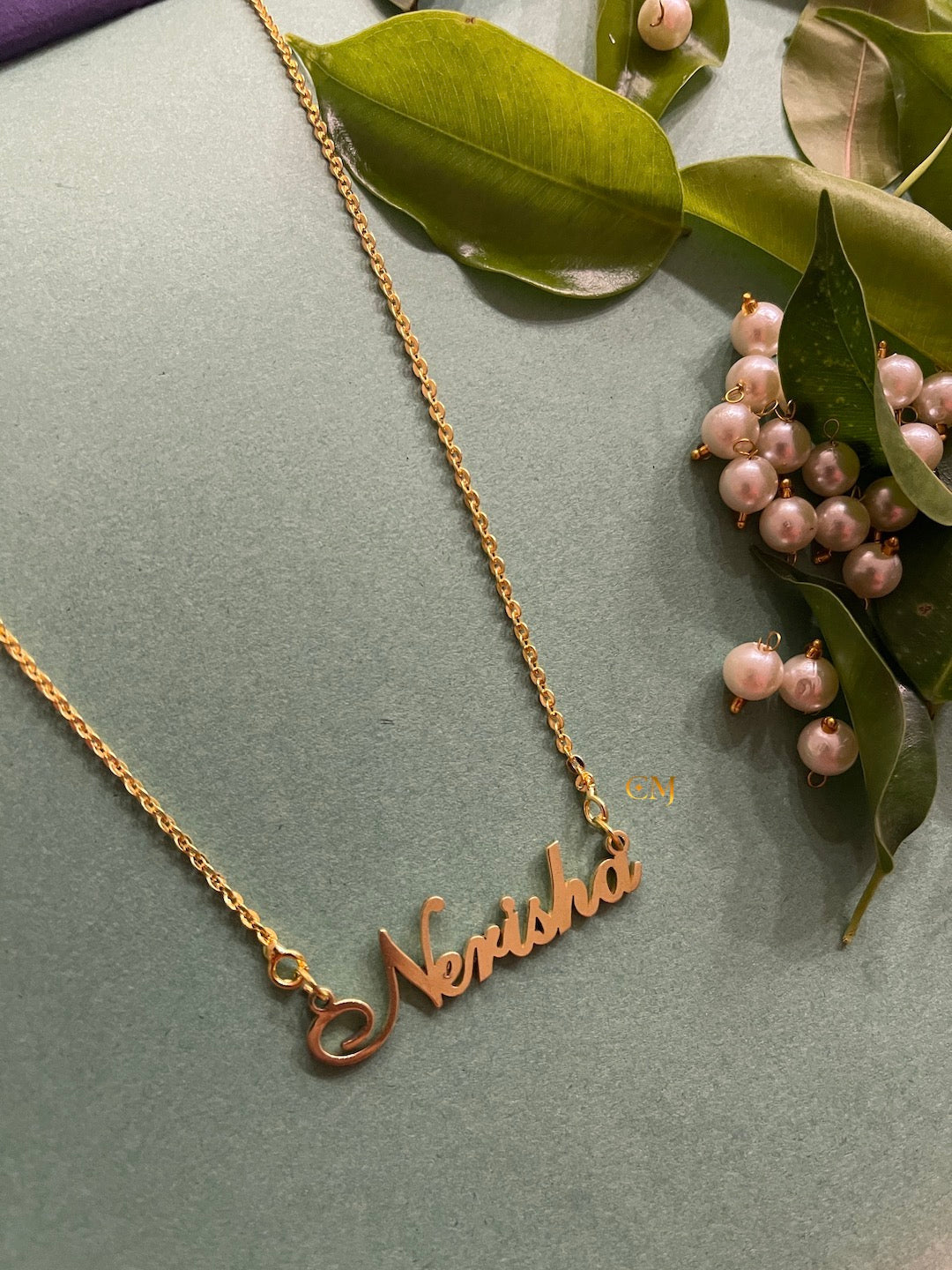 Manisha shop name pendant