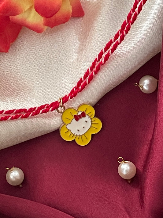 Yellow Flower With Cat Charm Rakhi Lumba