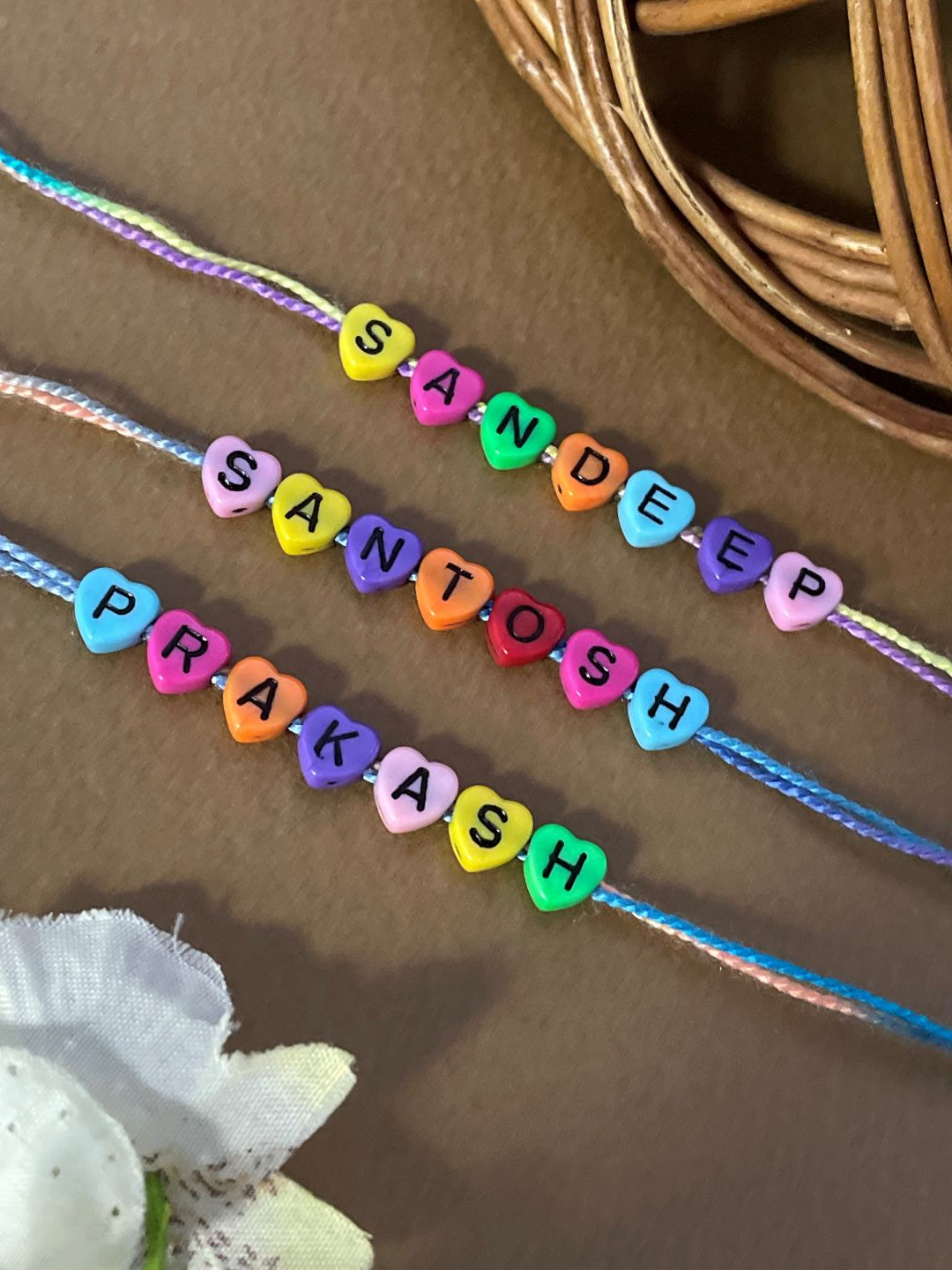 (Combo of 3) Custom Name Rakhi in Multcolor Color Heart Shaped Beads In MultiColor Thread