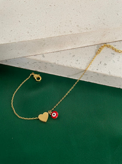 Gold Plated Heart Bracelet with Red Evil Eye Charm