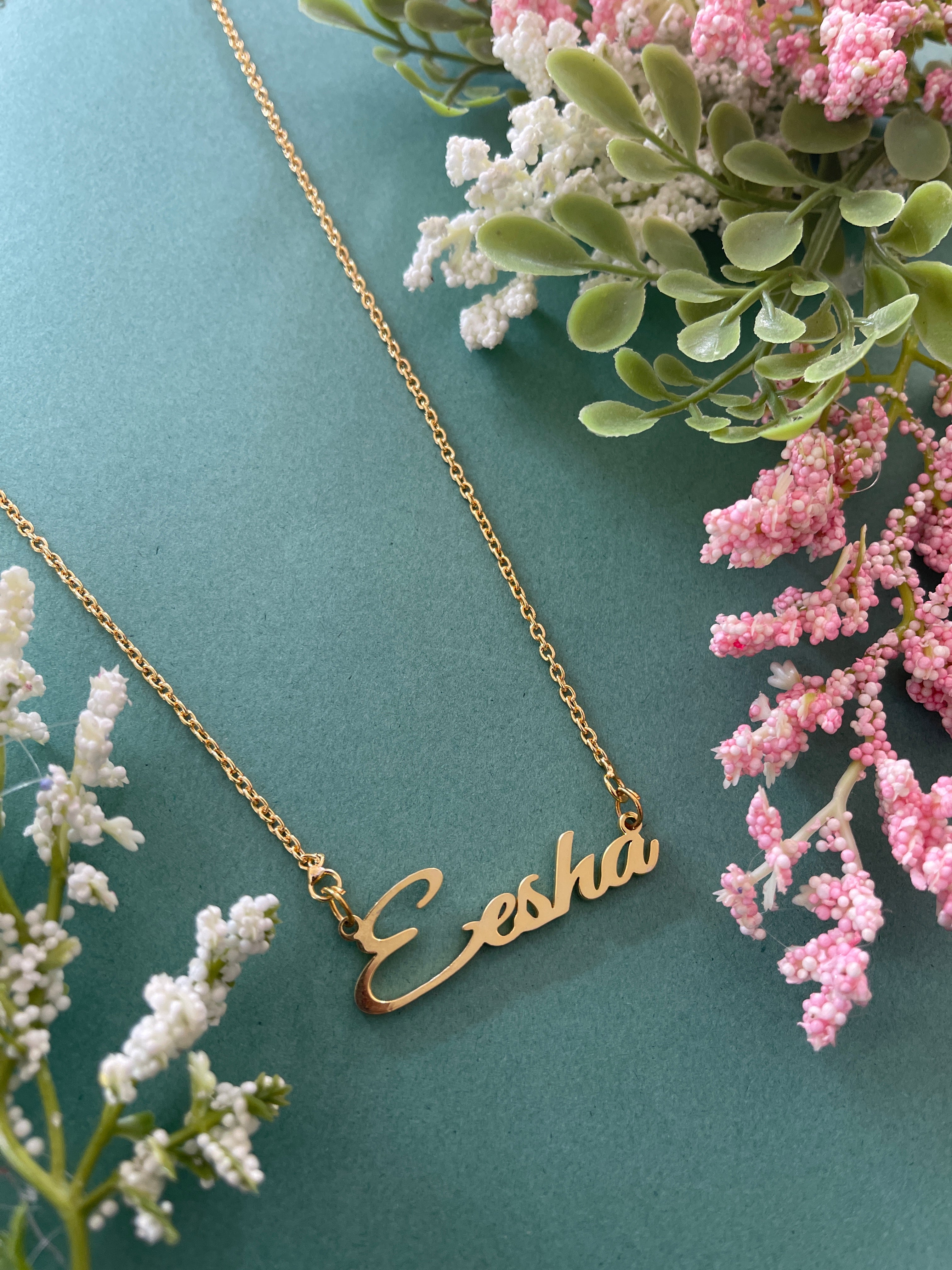 Gold cursive name on sale necklace