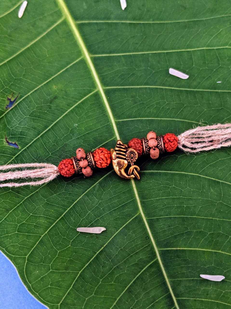 Antique Rakhi Designs Ganesha Face with Rudraksha/Tulsi Beads Pendant