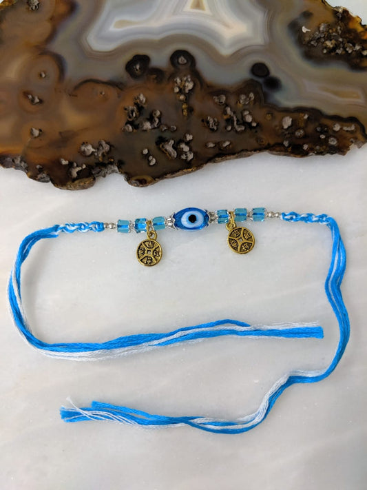 Digital Dress Room Blue Evil Eye Beads Rakhi for Men Gold Plated Round Pendant Rakhi