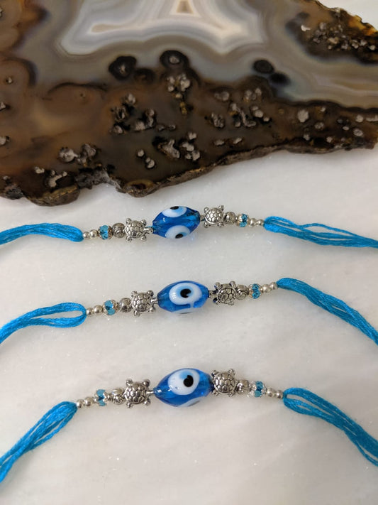 Digital Dress Room (Set of 3) Blue Evil Eye Rakhi with Tortoise Designer Silver Beads Thread Rakhi for Men