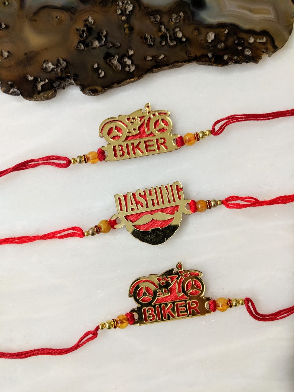 Digital Dress Room (Set of 3) Golden Rakhi with Dashing/ Biker Slogan Beads Red Thread Rakhi For Men