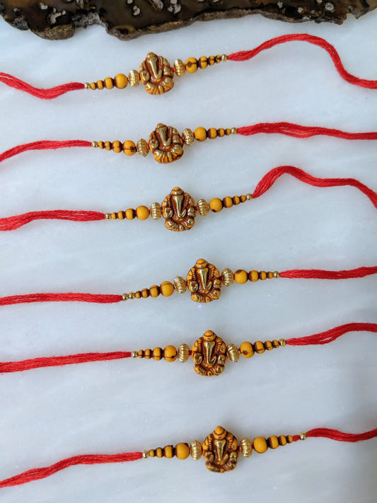 Digital Dress Room (Set of 6) Ganesh Ji Rakhi for Men Gold Yellow Beads Red Thread Rakhi