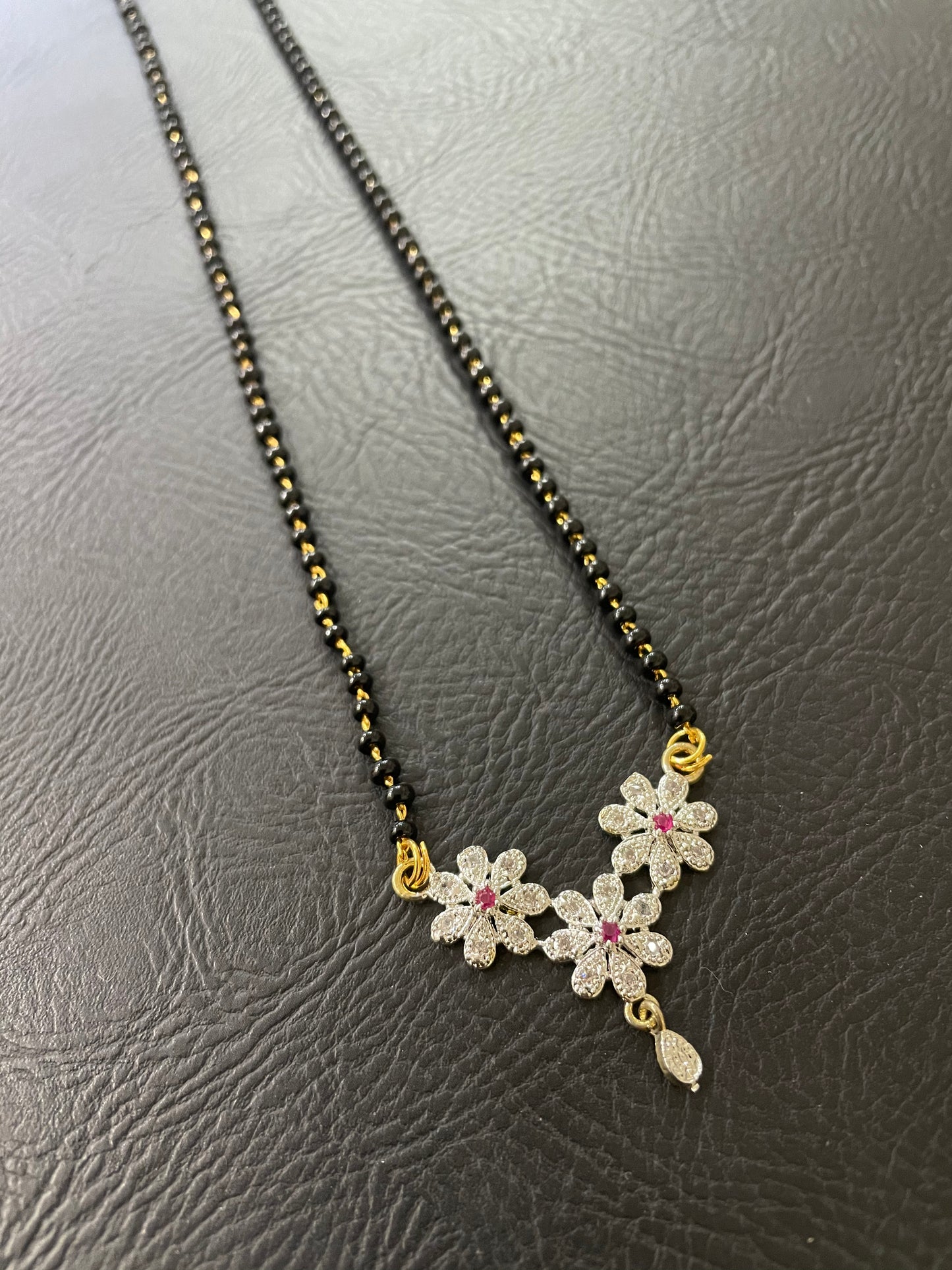 Short Mangalsutra Designs Gold Plated Latest American Diamond 3 Flower Pendant Latkan Black Beads Mangalsutra